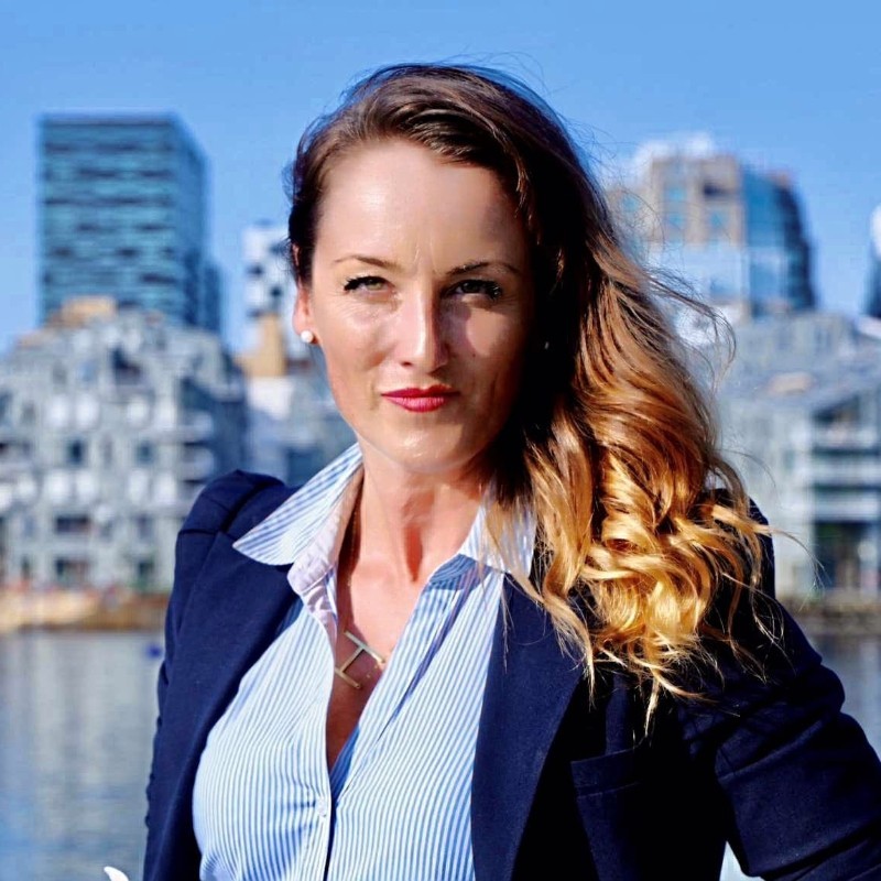 Rita Anson, NorBAN Secretary General and COO, with the Oslo waterfront behind